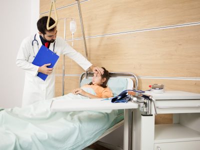 doctor-visitin-patient-girl-hospital-room